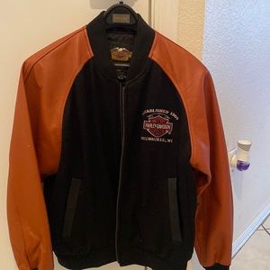 Woman Harley jacket label says XL, I believe that is extra large petite or youth